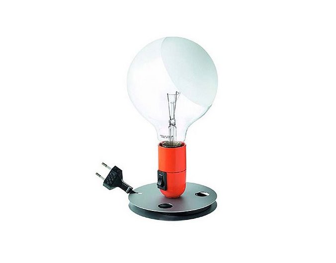 A Castiglioni-designed table lamp with an exposed bulb, part of the property's design collection