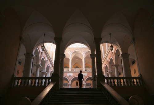 An arched courtyard interior, from the property's archived Genoa photography, associated with Palazzo Tursi